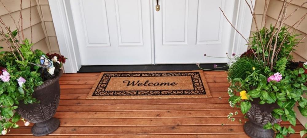 Welcome mat in front of door